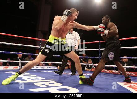 Callum Smith (right) and Patrick Mendy in action during the vacant English Super Middleweight Championship bout at Liverpool Olympia, Liverpool. Stock Photo