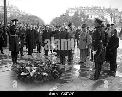 King George V at the Tomb of the Unknown Warrior after he placed a wreath. Also present were Marshal Foch and General Gourand. Stock Photo