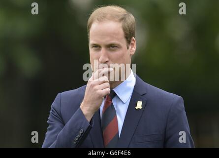 The Duke of Cambridge watches a match between the Civil Service FC and Polytechnic FC, in the grounds of Buckingham Palace's garden, central London. Stock Photo