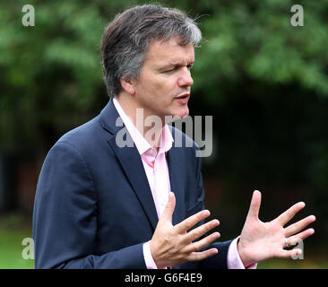 Liberal Democrat MP Michael Moore speaks to a TV crew close to his ...