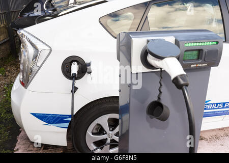 Toyota Prius handover - Lewes. A new Toyota Prius given on loan to Co Wheels car club at Lewes railway station in East Sussex. Stock Photo