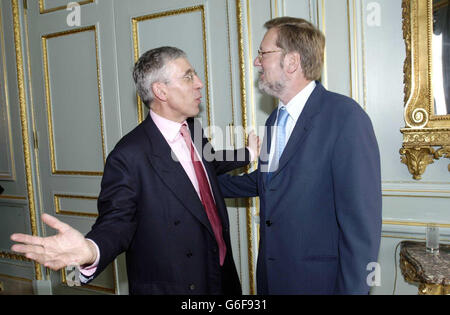 Foreign Secretary Jack Straw (left) with his Danish counterpart Per Stig Moeller, at Carlton Gardens, London. Straw answered questions on Saddam's weapons programmes at a news conference with the Danish Foreign Minister in London. * The pair have discussed Iraq and Per Stig Moeller stressed a need for a greater role for the UN in the country. Stock Photo