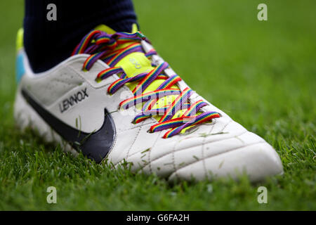Soccer - Barclays Premier League - West Ham United v Everton - Upton Park. Everton's John Heitinga displays rainbow laces on his boots in support of an Anti Homophobia campaign Stock Photo