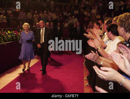 Britain's Queen Elizabeth II prepares to meet Promenaders during the interval of this year's 17th BBC Prom held at the Royal Albert Hall in London, as Her Majesty is led by Director of BBC Proms Nicholas Kenyon. Stock Photo