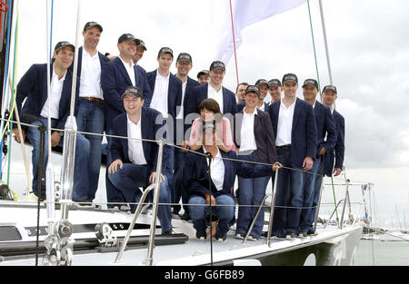 TV presenter Davina McCall poses with the crew during a photocall in Port Hamble, Hampshire, where she named Farr 65, a new racing yacht for designer brand Hugo Boss. McCall launched the 65ft 2million yacht just 3 days before the opening of Skandia Cowes Week. Stock Photo