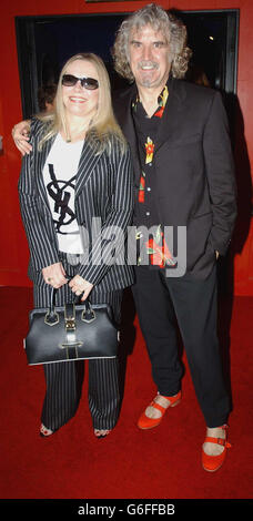 Comedian and actor Billy Connolly arriving with his wife Pamela Stephenson at the Warner Village cinema, Leicester Square, London, for the premiere of his new film 'The Man Who Sued God'. Stock Photo