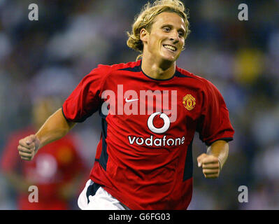 Manchester United's Diego Forlan celebrates scoring against Stoke City, during their friendly match at the Britannia Stadium, Stoke-on-Trent, Wednesday August 13, 2003. Stock Photo