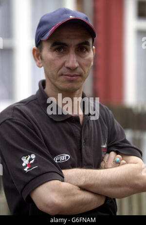 Former Iraq referee Furat Ahmed Kadoim, at his Winson Green, Birmingham home. The Iraqi football referee who was tortured on the orders of Saddam Hussein's son Uday has expressed delight and relief at news of the psychopathic killer's death. * Furat Ahmed Kadoim, who is living in Winson Green, Birmingham, after fleeing to England seven months ago, said he had been contacted by numerous friends who were overjoyed that Uday and Qusay were dead. The 37-year-old Fifa-registered official - who was jailed three times after refusing to obey Uday's demands to cheat and let his favourite soccer team Stock Photo