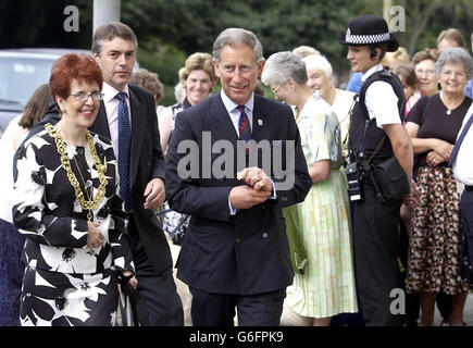 The Prince of Wales arrives with Lord Provost Liz Cameron at the Weir Pumps in Cathcart, Glasgow where he visited workers at Scotland's largest engineering firm. Charles, known as the Duke of Rothesay in Scotland, dropped in on staff and management at the Weir Group in Glasgow at the start of a day of visits around the country. Weir employs around 8,000 people worldwide making specialist pumping equipment from the defence and nuclear industries to the power generation and water treatment sectors. Stock Photo