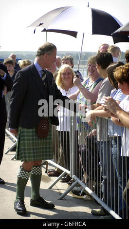 The Prince of Wales is greeted by wellwishers at Scrabster Harbour Board in Cathness where he opened The Queen Elizabeth Pier as part of his continuing tour of the north of Scotland. Stock Photo