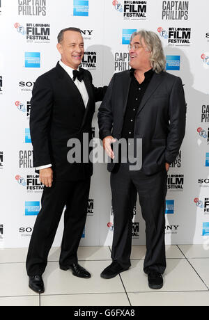 Tom Hanks and Paul Greengrass arriving at the 57th BFI London Film Festival Opening Night Gala European Premiere of Captain Phillips at The Odeon, Leicester Square, London. PRESS ASSOCIATION Photo. Issue date: Wednesday October 9, 2013. Photo credit should read: Ian West/PA Wire Stock Photo