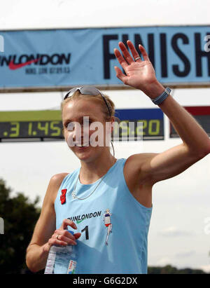 British athlete Paula Radcliffe celebrates after winning the women's Nike 10K road race in Richmond Park, London. World marathon record holder Radcliffe made a triumphant return from injury to finish seventh overall in the mixed event. Stock Photo