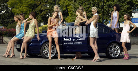 New models from Select Models pose with the new Jaguar X-TYPE Diesel during a photocall to launch a partnership between Select and Jaguar at Marble Arch in central London. The new Jaguar will be used to drive Select's major-league models during London Fashion Week, which begins on Saturday 20 September 2003. Stock Photo