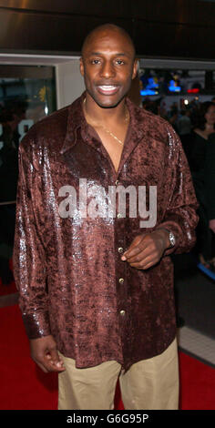 John Fashanu arrives for the UK premiere of Calendar Girls at the Odeon West End in London's Leicester Square. Stock Photo