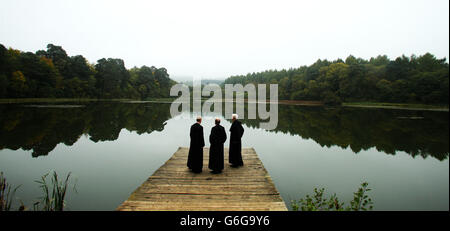 (left to right) Father Luke and Father Gordon and Father Matthew look ...
