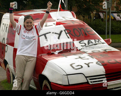 Gaelic Athletic Association fan Michelle O'Kane,13, with a van painted in her county s colours in Strabane, Co Tyrone, ahead of the All-Ireland football final between Tyrone and defending champions Armagh. Tomorrow sees the biggest north-south exodus since the Pope s visit to Ireland nearly 25 years ago. Police on both sides of the border have made special arrangements to cope with an unprecedented volume of traffic between Northern Ireland and Dublin. Stock Photo