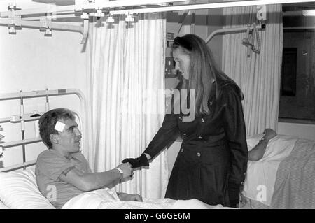 The Duchess of York at St George's Hospital, Tooting, London, to chat to Mickey Costen, 21, a railwayman from Basingstoke who was knocked unconscious in the multiple train crash near Clapham Junction, London. Costen suffered gashes to his head and leg, and bruises to his arms. Stock Photo