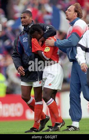 22-JUN-96. Netherlands v France. A tearful Clarence Seedorf of the Netherlands is consolidated by team mates after his penalty miss Stock Photo