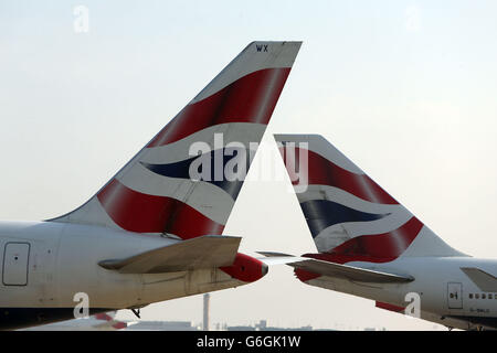 Heathrow Airport Feature. British Airways planes taxi at Heathrow Airport Stock Photo