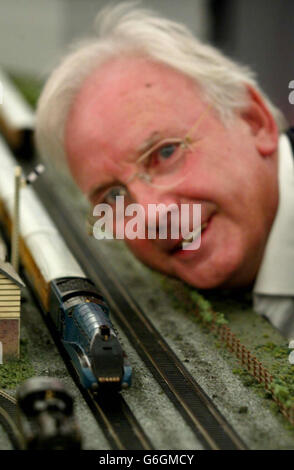 Railway enthusiast and pop impresario Pete Waterman looks on as Hornby launches its first Live Steam Locomotive, the Mallard, part of it's new 'OO' gauge Live Steam working models range at the Goodwood Revival Meeting. Hornby said the first model - the classic A4 Mallard, would be in the shops in time for Christmas. Stock Photo