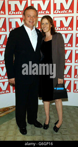 Actor Martin Clunes and his wife Philippa Braithwaite arrive for the TV Quick awards at the Dorchester Hotel, in London. Stock Photo