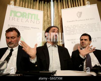 Independent TD Luke Ming Flanagan (centre) alongside Dr Cathal O Suiliobhain (left) and Dr Garrett McGovern, a GP specializing in addiction, at a press conference in Buswells Hotel, Molesworth Street, Dublin, where he claimed decriminalising cannabis could save Ireland 300 million euro (&pound;256 million) a year. Stock Photo