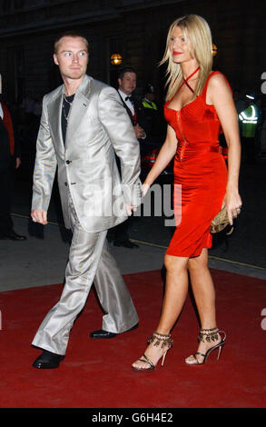 Singer Ronan Keating and wife Yvonne arrive for the GQ Man of the Year Awards at The Royal Opera House in central London. Stock Photo