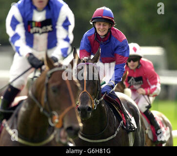 'The Tote Silver Cup'. Native Title ridden by jockey Joanna Badger (centre) wins 'The Tote Silver Cup' at Ayr Racecourse. Stock Photo