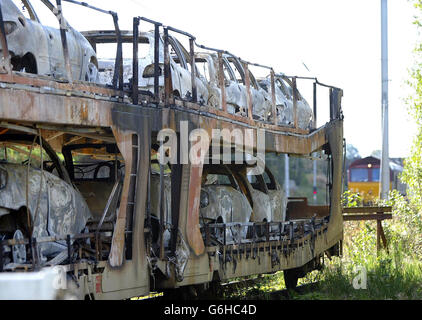 Train fire burnt out cars Stock Photo