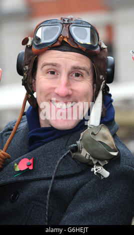 Anton du Beke sits in a Spitfire while selling poppies in Covent Garden, London. Stock Photo