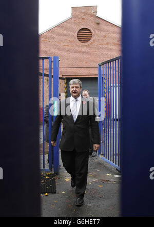 Alistair Carmichael, the UK Government's Scottish Secretary, leaves the BAE shipyard in Govan, Glasgow, as Labour leader Ed Miliband refused to offer a jobs guarantee to shipyard workers on the Clyde if Scotland decides to back independence. Stock Photo