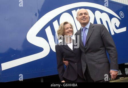 Conservative Party leader Iain Duncan Smith, and his wife Betsy, tour a plastics factory in Blackpool, during the party conference this week. Duncan Smith today brushed aside suggestions that the party's 'men in grey suits' were set to call time on his leadership. Amid claims that up to 15 Tory backbenchers were calling for a vote of no confidence in his leadership, Mr Duncan Smith insisted that his focus was on ending Tony Blair's premiership. Stock Photo