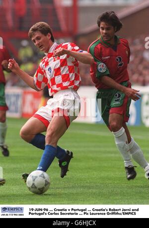 19-JUN-96 ... Croatia v Portugal ... Croatia's Robert Jarni and Portugal's Carlos Secretario Stock Photo