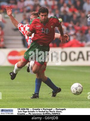 19-JUN-96. Croatia v Portugal. Portugals Luis Figo breaks is fouled by Dario Simic, Croatia Stock Photo