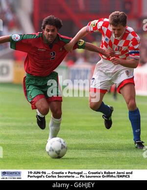 Croatia's Robert Jarni and Portugal's Carlos Secretario Stock Photo