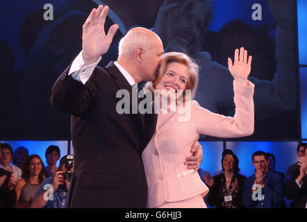 Tory leader Iain Duncan Smith and his wife Betsy receive a standing ovation following his speech to the Conservative Party conference in Blackpool. Mr Duncan Smith today warned his party critics: 'Get on board or get out of our way.' He said he now had 'the most radical policy agenda of any party aspiring to Government since 1979'. And he accused Prime Minister Tony Blair directly of lying over the death of weapons expert Dr David Kelly, saying the scientist had been used by the Government 'as a pawn in its battle with the BBC'. Stock Photo