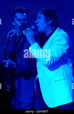John Taylor (left) and lead singer Simon Le Bon from Duran Duran performs live on stage for their first UK concert in 18 years at The Forum in London. Stock Photo