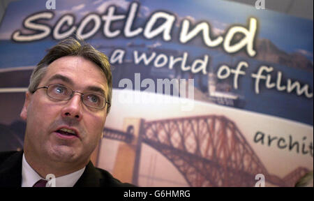 Culture minister Frank McAveety at Scottish Screen headquarters in Glasgow,following the announcement that Hollywood star George Clooney will start filming a 19 million ($32 million) blockbuster in Scotland early next year. Oscar-winning actor Adrian Brody and newcomer Keira Knightley will star in the thriller about a Gulf War veteran who is accused of a murder he does not remember committing. The Jacket, which is set in North America, will be shot in West Lothian and locations in Glasgow, with filming due to start in January. It is expected to last seven weeks and will generate an estimated Stock Photo