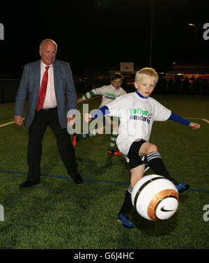 Football Association Chairman Greg Dyke watches children playing on the new all weather pitches during the opening of the new football centre at the Gloucestershire FA HQ at Oaklands Park in Almondsbury. PRESS ASSOCIATION Photo. Picture date: Friday November 8, 2013. Photo credit should read: Nick Potts/PA Wire Stock Photo