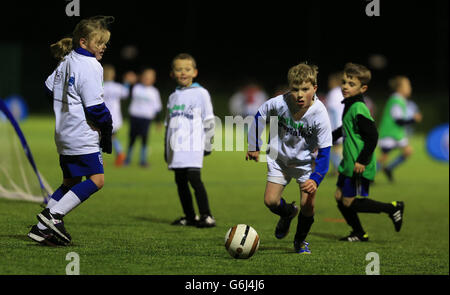 Children play on the new all weather pitches during the opening of the new football centre at the Gloucestershire FA HQ at Oaklands Park in Almondsbury. PRESS ASSOCIATION Photo. Picture date: Friday November 8, 2013. Photo credit should read: Nick Potts/PA Wire Stock Photo