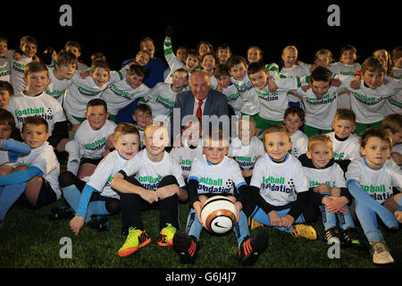 Football Association Chairman Greg Dyke with children who will play on the new all weather pitches during the opening of the new football centre at the Gloucestershire FA HQ at Oaklands Park in Almondsbury. PRESS ASSOCIATION Photo. Picture date: Friday November 8, 2013. Photo credit should read: Nick Potts/PA Wire Stock Photo