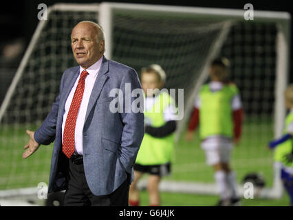 Football Association Chairman Greg Dyke watches children play football on the new all weather pitches during the opening of the new football centre at the Gloucestershire FA HQ at Oaklands Park in Almondsbury. PRESS ASSOCIATION Photo. Picture date: Friday November 8, 2013. Photo credit should read: Nick Potts/PA Wire Stock Photo