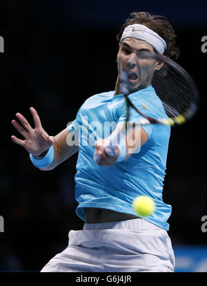 Rafael Nadal competes against Tomas Berdych during day five of the Barclays ATP World Tour Finals at the O2 Arena, London. Stock Photo