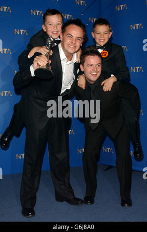 (Foreground left to right) Ant McPartlin and Declan Donnelly and (background) Little Ant 'n' Dec with their award for Most Popular Entertainment Programme during the annual National Television Awards at the Royal Albert Hall in central London. Stock Photo