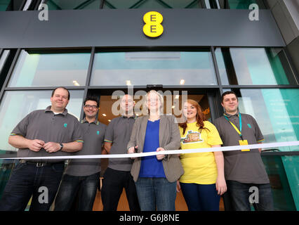 Regional Manager Clare Dodson, (centre), opens the new store with (left to right) Alex Smith, Stephen Raper, Chris Blewitt, Bethan Young and Justin Goodwin, at the new branch of EE at the Team Valley Retail Park in Gateshead, Tyne and Wear, which opens this weekend. Stock Photo