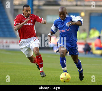 Millwall's Aboubaka Fofana (right) and Nottingham Forest's Matthieu Louis-Jean in action during their Division One match at the New Den, London, Sat during their Nationwide Division One match at Millwall's The Den ground in London . Stock Photo