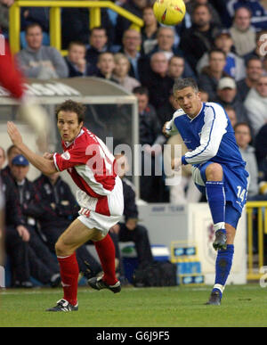 Millwall's Andy Roberts (right) and Nottingham Forest's Eoin Jess in action during their Nationwide Division One match at Millwall's The Den ground in London NO UNOFFICIAL CLUB WEBSITE USE. Stock Photo