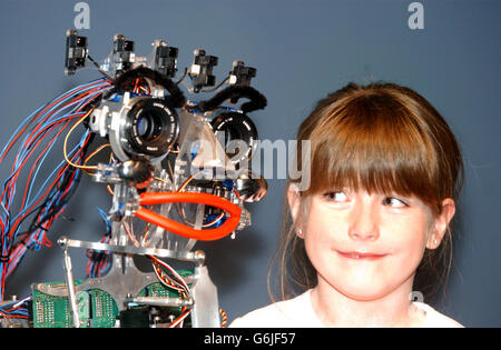 Science and Technology - Georgia Anderson and 'eMo' the Robot - Birmingham Science Museum Stock Photo