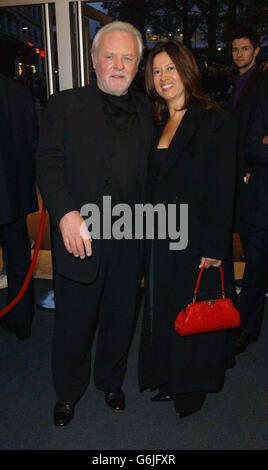 Actor Sir Anthony Hopkins, who plays Coleman Silk, with his wife Stella, arrive at the premiere of his latest film, The Human Stain, held at the Odeon West End, London, which forms part of the London Film Festival. Stock Photo