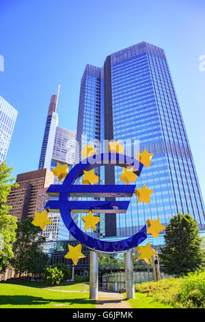 FRANKFURT ON THE MAIN, GERMANY - CIRCA JUNE, 2016: Euro Sculpture in front of Eurotower in The City of Frankfurt on the Main, Ge Stock Photo